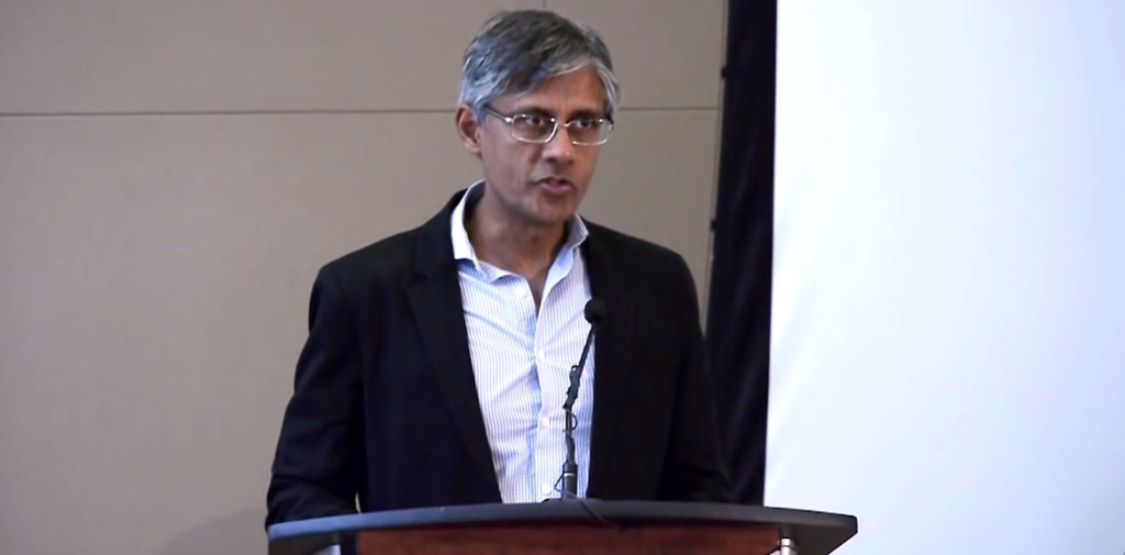Jayant Bhandari was born in India but is a Canadian citizen and now spends most of his time in Singapore. He is a junior mining analyst and the host of the annual Capitalism & Morality conference in Vancouver. Here is speaking at the 2016 event. (Screenshot: CapitalismMorality)