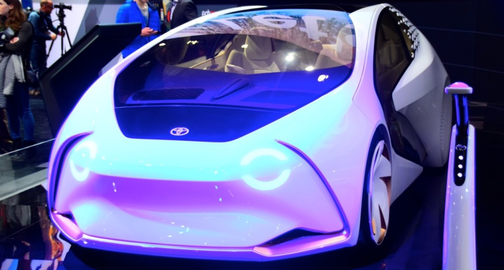 Self-driving cars are still in their infancy at the consumer level, but major manufacturers see the (creative destruction) writing on the wall and are already utilizing artificial intelligence as a gateway. This one is the Toyota Concept-i. (Matthew Stevens)