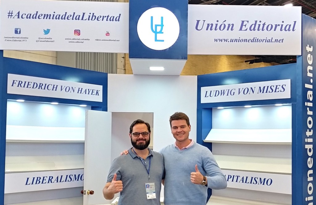 Jorge Eduardo Castro (left) was setting up his stand at the 2018 Bogotá International Book Fair. His publishing house, Unión Editorial, educates readers in classical liberalism, economics, and finance.